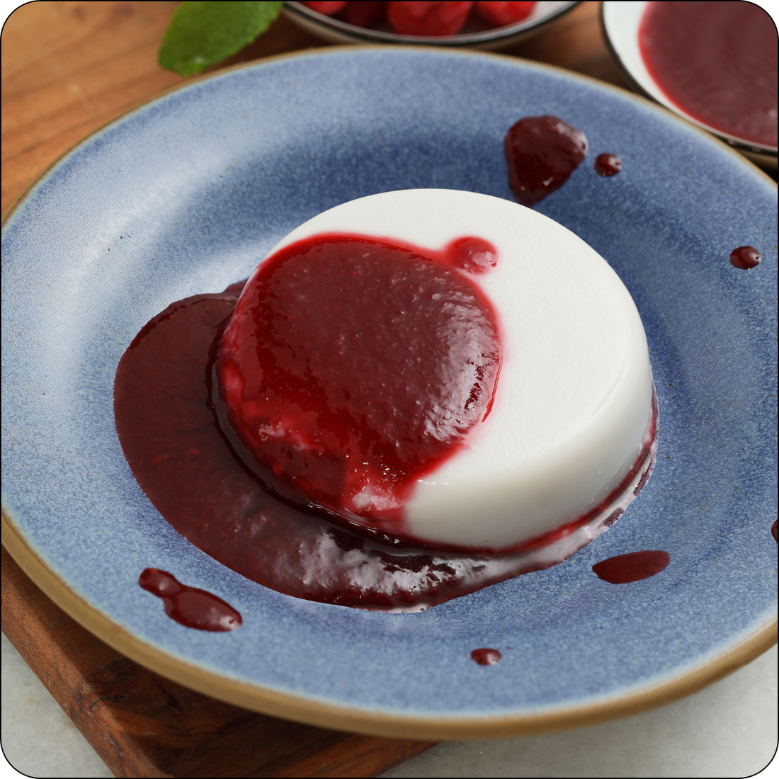 COCONUT PANNA COTTA  WITH RASPBERRY COULIS